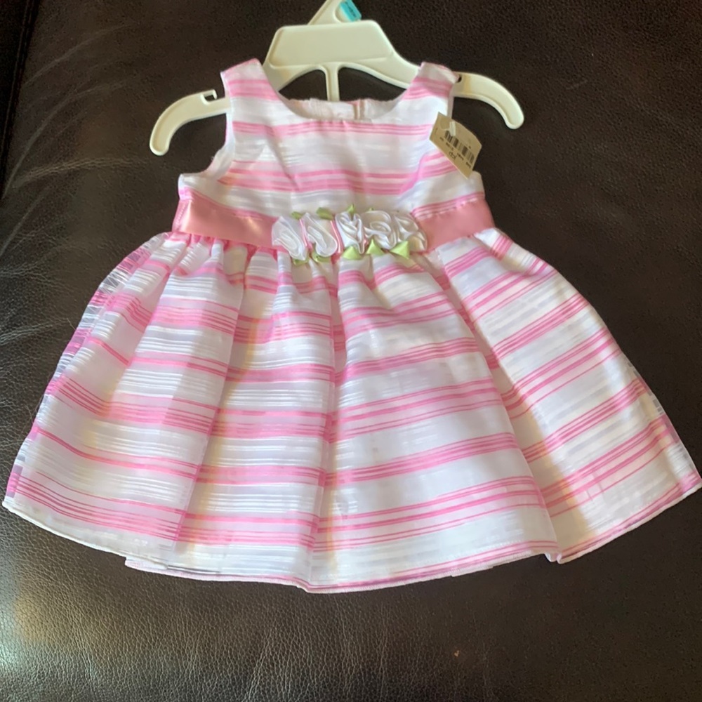 Young Land baby brand. Newborn 3/6 months size. Never worn and with tag.
